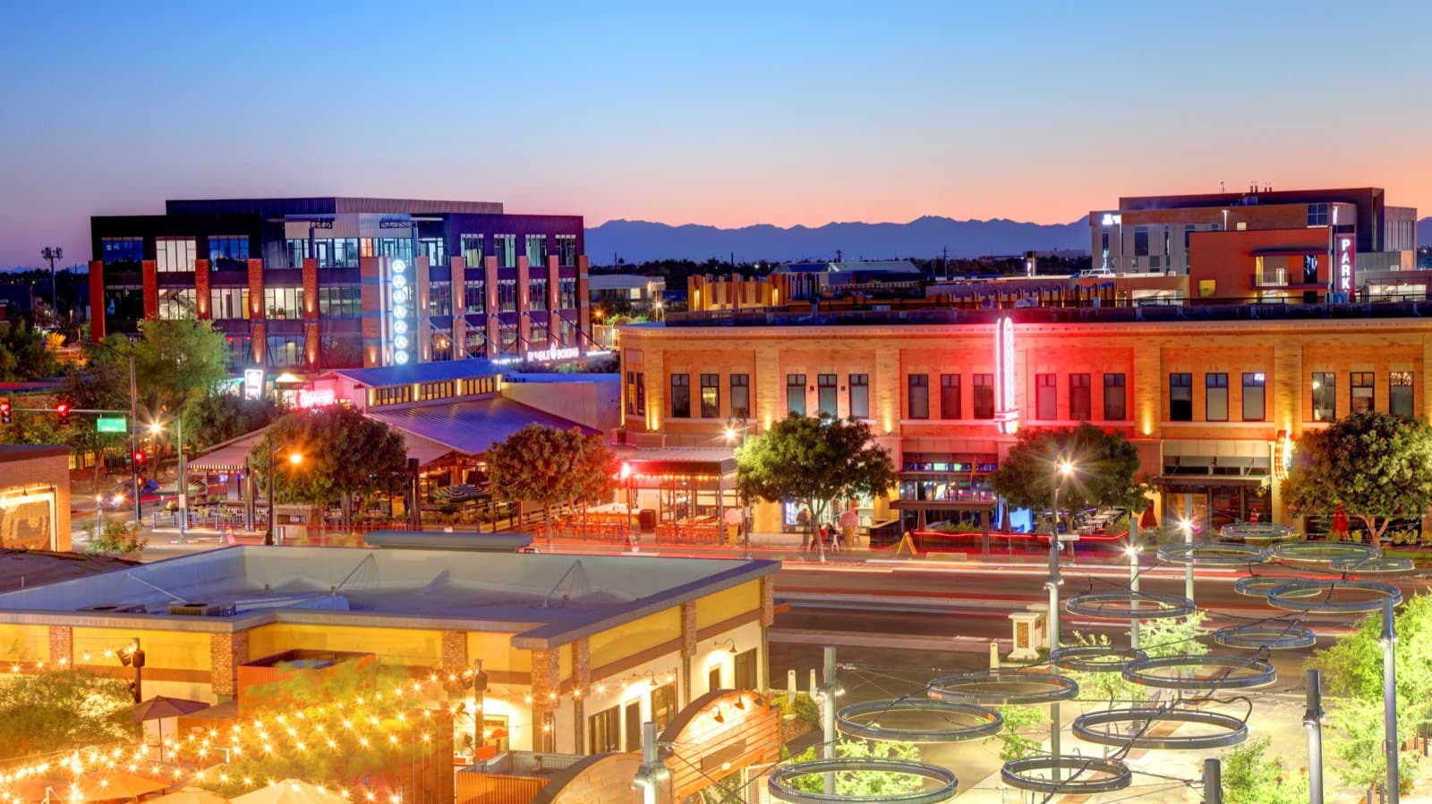 Downtown Gilbert Heritage District lit up at dusk